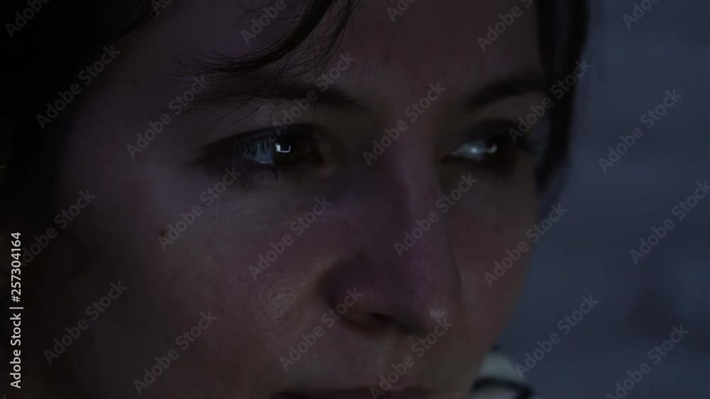 4k close up of woman eyes reading computer screen working or studying at night. In overworked fatigue and discomfort. Eye damage of looking at screen. Computer vision syndrome. 4k close up of woman eyes reading computer screen working or studying at night. In overworked fatigue and discomfort. Eye damage of looking at screen. Computer vision syndrome.