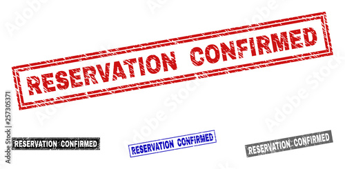 Grunge RESERVATION CONFIRMED rectangle stamp seals isolated on a white background. Rectangular seals with grunge texture in red, blue, black and gray colors.