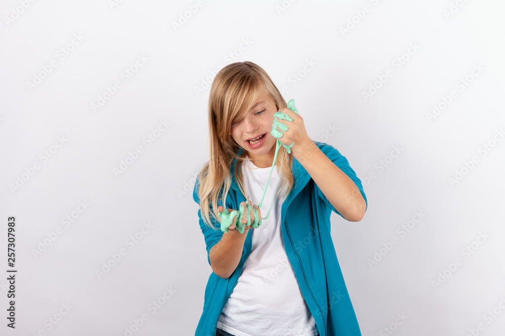 Cute girl playing with green slime looks like gunk Cute girl playing with green slime looks like gunk