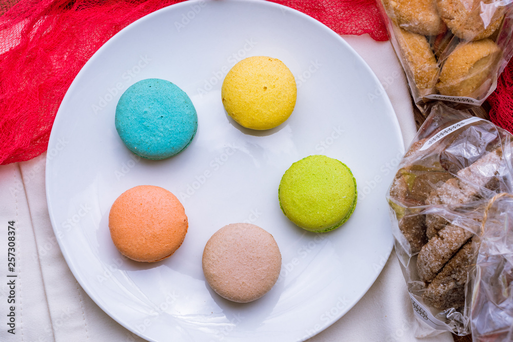 multicolored macaroons in plate multicolored macaroons in plate