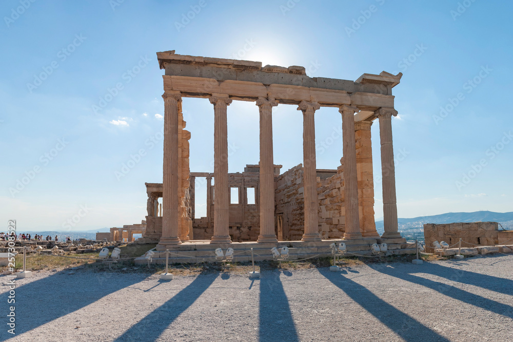 Erechtheion temple in Athens during the sunset. Ruins of the Temple of Erechtheion at the Acropolis hill in Greece. UNESCO World Hetiage site