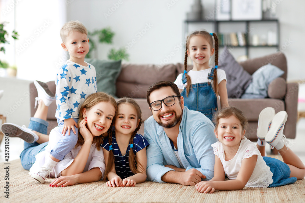 happy large family mother father and children at home happy large family mother father and children at home