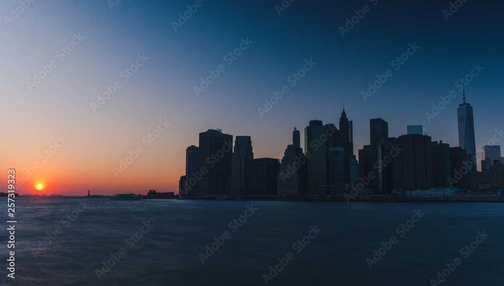 Long exposure Manhattan skyline at sunset Long exposure Manhattan skyline at sunset
