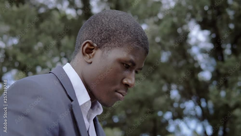 stressed pensive handsome black african business man in the park stressed pensive handsome black african business man in the park