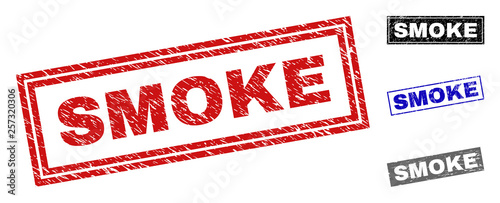 Grunge SMOKE rectangle stamp seals isolated on a white background. Rectangular seals with grunge texture in red, blue, black and grey colors.