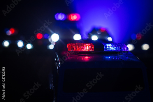 Фотография Police cars at night