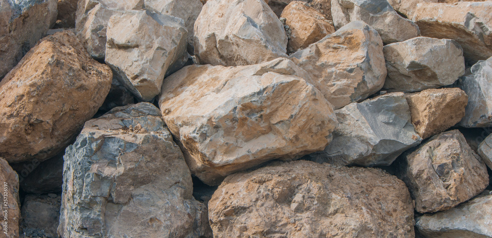large stone boulders at a construction site large stone boulders at a construction site