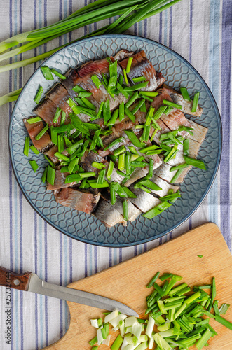 Herring fillet with green onions