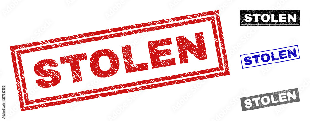 Grunge STOLEN rectangle stamp seals isolated on a white background. Rectangular seals with grunge texture in red, blue, black and grey colors. Grunge STOLEN rectangle stamp seals isolated on a white background. Rectangular seals with grunge texture in red, blue, black and grey colors.