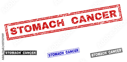 Grunge STOMACH CANCER rectangle stamp seals isolated on a white background. Rectangular seals with grunge texture in red, blue, black and grey colors.