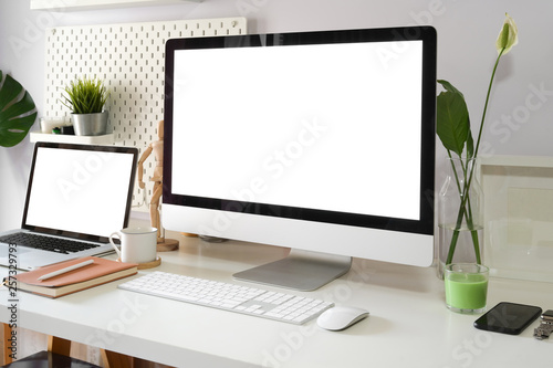 Stylish loft workspace with office supplies