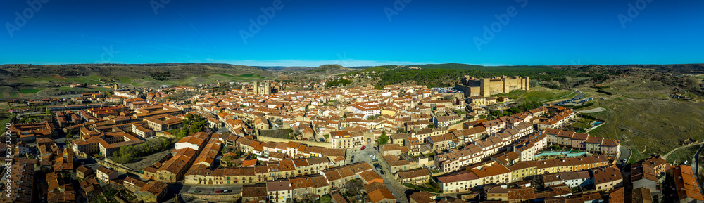 Siguenza aerial panorama of castle and town with blue sky in Spain