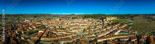 Fototapeta Naklejka Na Ścianę i Meble -  Siguenza aerial panorama of castle and town with blue sky in Spain
