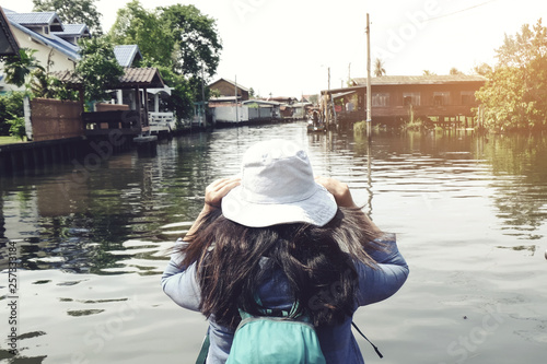 woman travel by boat at Bangkok Thailand photo