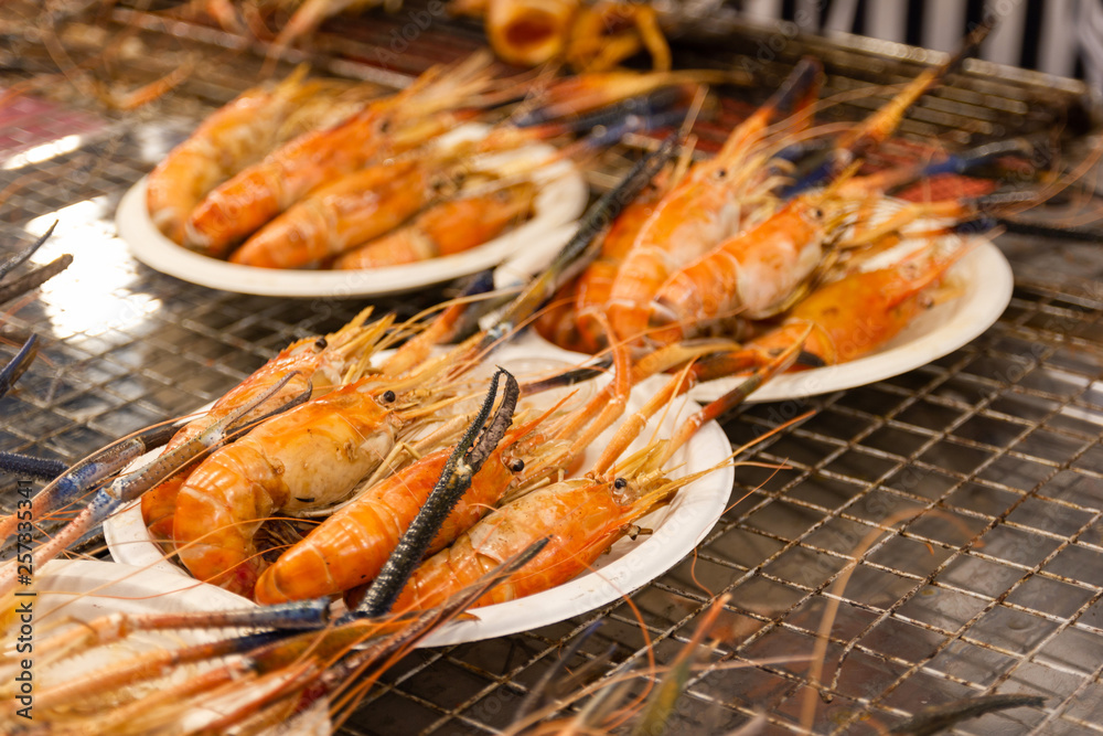 Grilled shrimps seafood on the table in market of Bangkok Thailand 