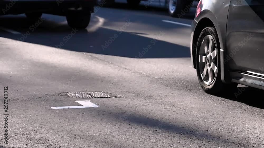 Car wheels running on the road