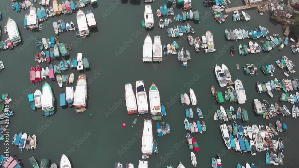 Aerial top view of a lot of boats and yacht docked at the sea Aerial top view of a lot of boats and yacht docked at the sea