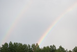 Double rainbow and sunbeams