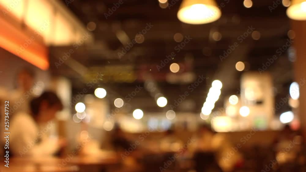 Timelapse shot of blurred people in a cafe Timelapse shot of blurred people in a cafe