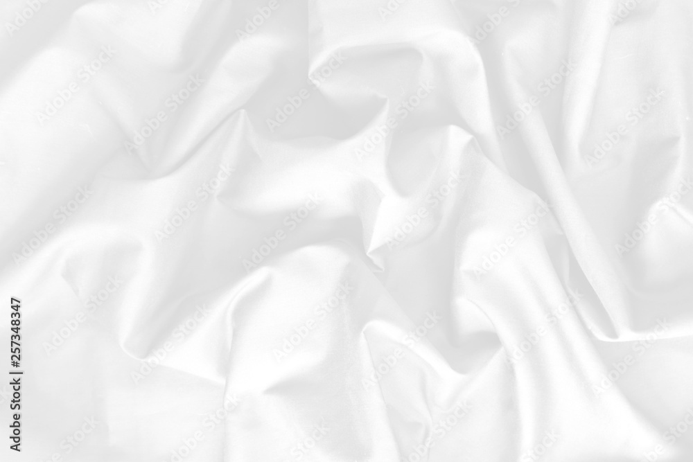 Obraz premium The background of the white fabric that is wavy – Image
