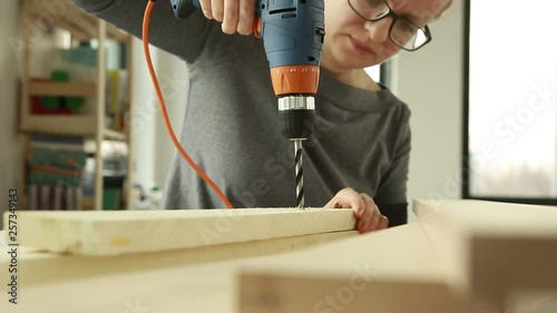 female, woman, machine, carpenter, young, worker, tool, work, equipment, occupation, wood, electric, drilling, building, working, workshop, concept, industry, girl, background, using, white, attractiv