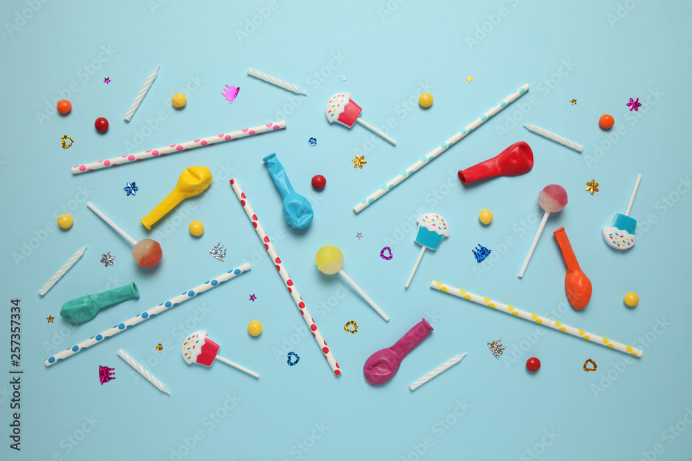 Festive background (pattern) of children's holiday. Cheerful birthday party with sweets on blue background. Festive background (pattern) of children's holiday. Cheerful birthday party with sweets on blue background.