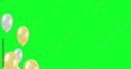 Flying gold and silver balloons on green background. Elegant concept for party, birthday, anniversary, wedding, web design.