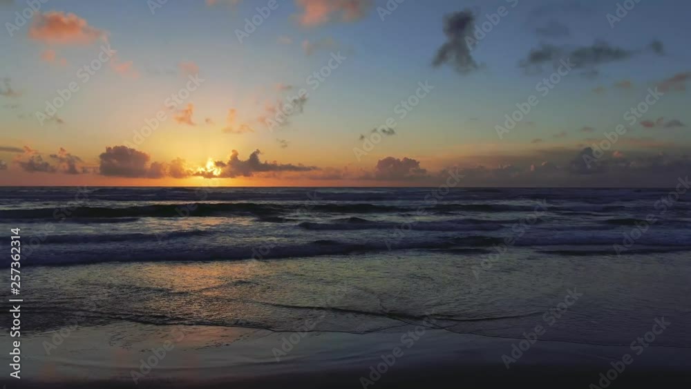 Blazing colors of sunset beach, rhythmically beaten by Pacific Ocean Waves. Natural golden saturation. Drone based aerial footage. Cinematic and beautiful. calming and Relaxed Euphoric camping Blazing colors of sunset beach, rhythmically beaten by Pacific Ocean Waves. Natural golden saturation. Drone based aerial footage. Cinematic and beautiful. calming and Relaxed Euphoric camping