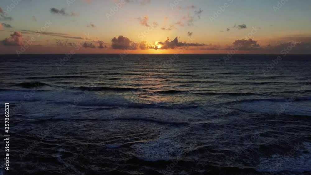 Blazing colors of sunset beach, rhythmically beaten by Pacific Ocean Waves. Natural golden saturation. Drone based aerial footage. Cinematic and beautiful. calming and Relaxed Euphoric camping Blazing colors of sunset beach, rhythmically beaten by Pacific Ocean Waves. Natural golden saturation. Drone based aerial footage. Cinematic and beautiful. calming and Relaxed Euphoric camping
