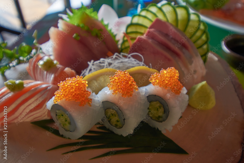 A set of 3 kinds of fish in a sashimi menu. A set of 3 kinds of fish in a sashimi menu.