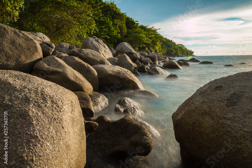 Long exposure shot.Sea scape with stone beach at sunset,Motion blur,slow shutter speed.