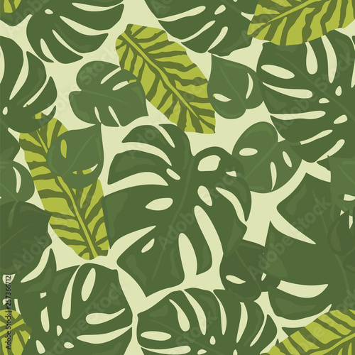 Monstera tropical forest leaves background. Green seamless pattern