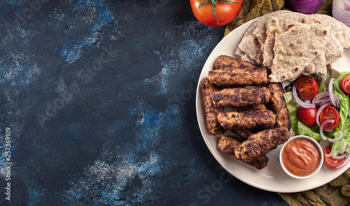 Bild auf Leinwand Kebapche or cevapcici, balkan minced meat kebab