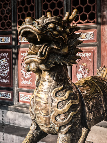 Dragon sculpture at Qingyang Temple photo