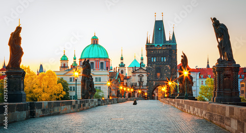 Scenic view on Vltava rive, Charles bridge and historical center of Prague, buildings and landmarks of old town at sunset, Prague, Czech Republic