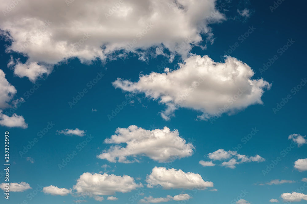 Blue spring sky with fluffy white clouds. Blue spring sky with fluffy white clouds.