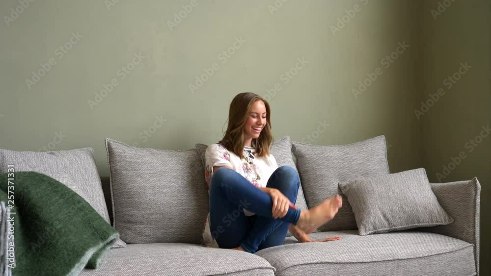 Fresh woman sitting on couch Fresh woman sitting on couch