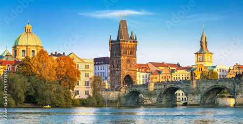 Scenic view on Vltava rive, Charles bridge and historical center of Prague, buildings and landmarks of old town at sunset, Prague, Czech Republic