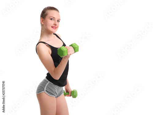 Nice sexy woman doing workout with dumbbell © zhagunov_a