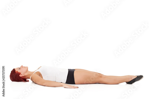 Pretty sporty woman in doing yoga