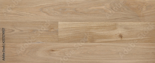 parquet from solid wood. sample of parquet. texture or background. wood texture. board. painted with natural oil. wax. mastic. imitation of valuable species of wood.