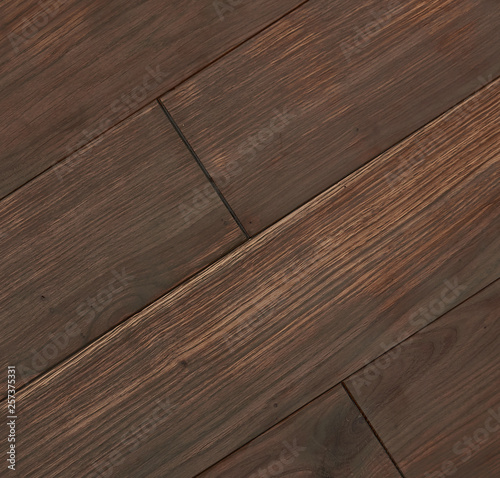 parquet from solid wood. sample of parquet. texture or background. wood texture. board. painted with natural oil. wax. mastic. imitation of valuable species of wood.