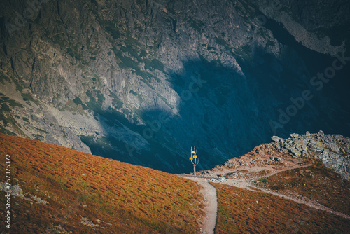 Turist Sign in mountains. Desision making, choice, vision, concept photo photo