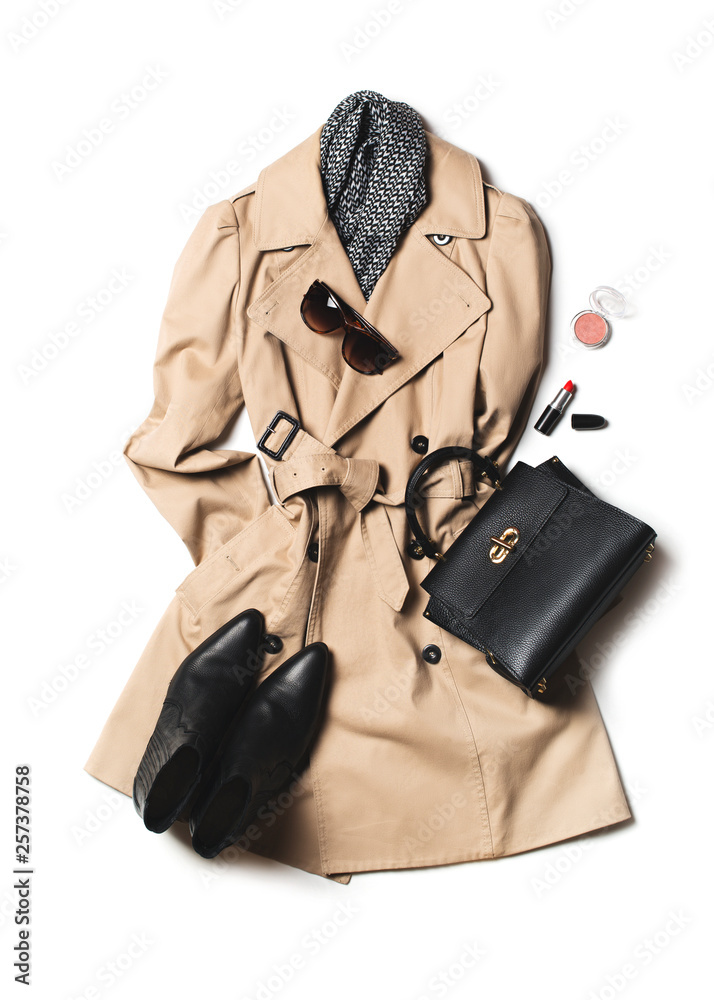 Women fashion clothes and accessories flat lay, beige trench coat with bag,  glasses and western boots Stock Photo | Adobe Stock