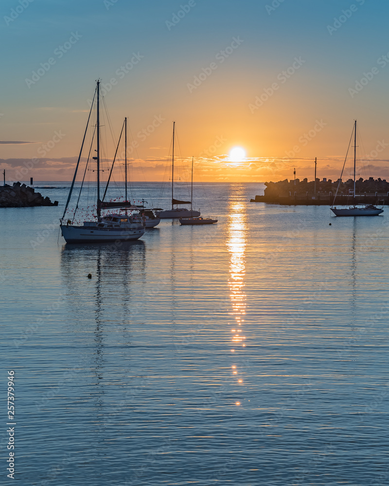 Sunrise and boats in the harbour