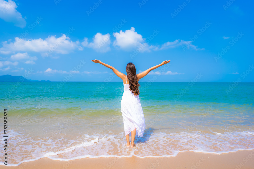 Portrait beautiful young asian woman happy smile leisure on the beach sea and ocean Portrait beautiful young asian woman happy smile leisure on the beach sea and ocean
