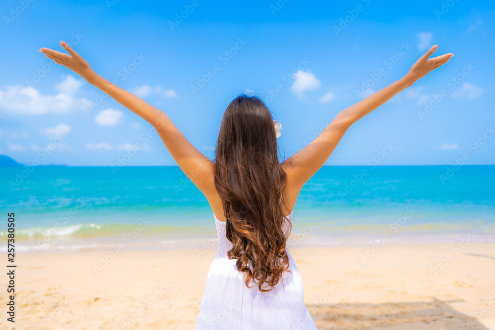 Portrait beautiful young asian woman happy smile leisure on the beach sea and ocean Portrait beautiful young asian woman happy smile leisure on the beach sea and ocean
