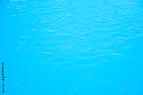 Texture of blue and clear water,Swimming pool background