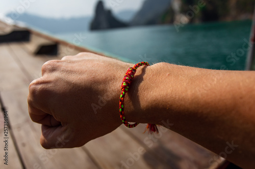 Sacred thai sai sin bracelet provides protection and good health to the person wearing it. The color of the thread represents different meanings