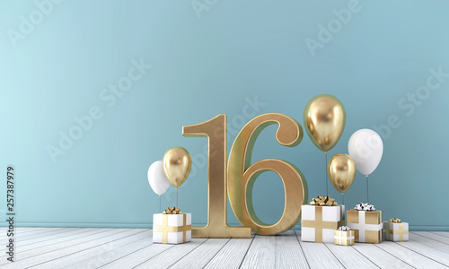 Number 16 party celebration room with gold and white balloons and gift boxes.  photo